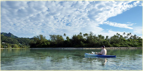Karsten our guests paddling on the calm lagoon