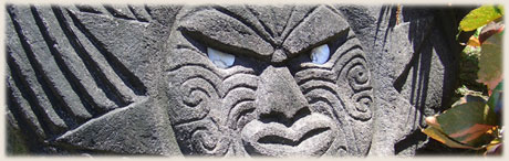 stone carving showing tropical sun / moonrise over Muri Lagoon / photos: Archi